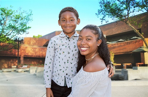 Mother and son in front of The Centre