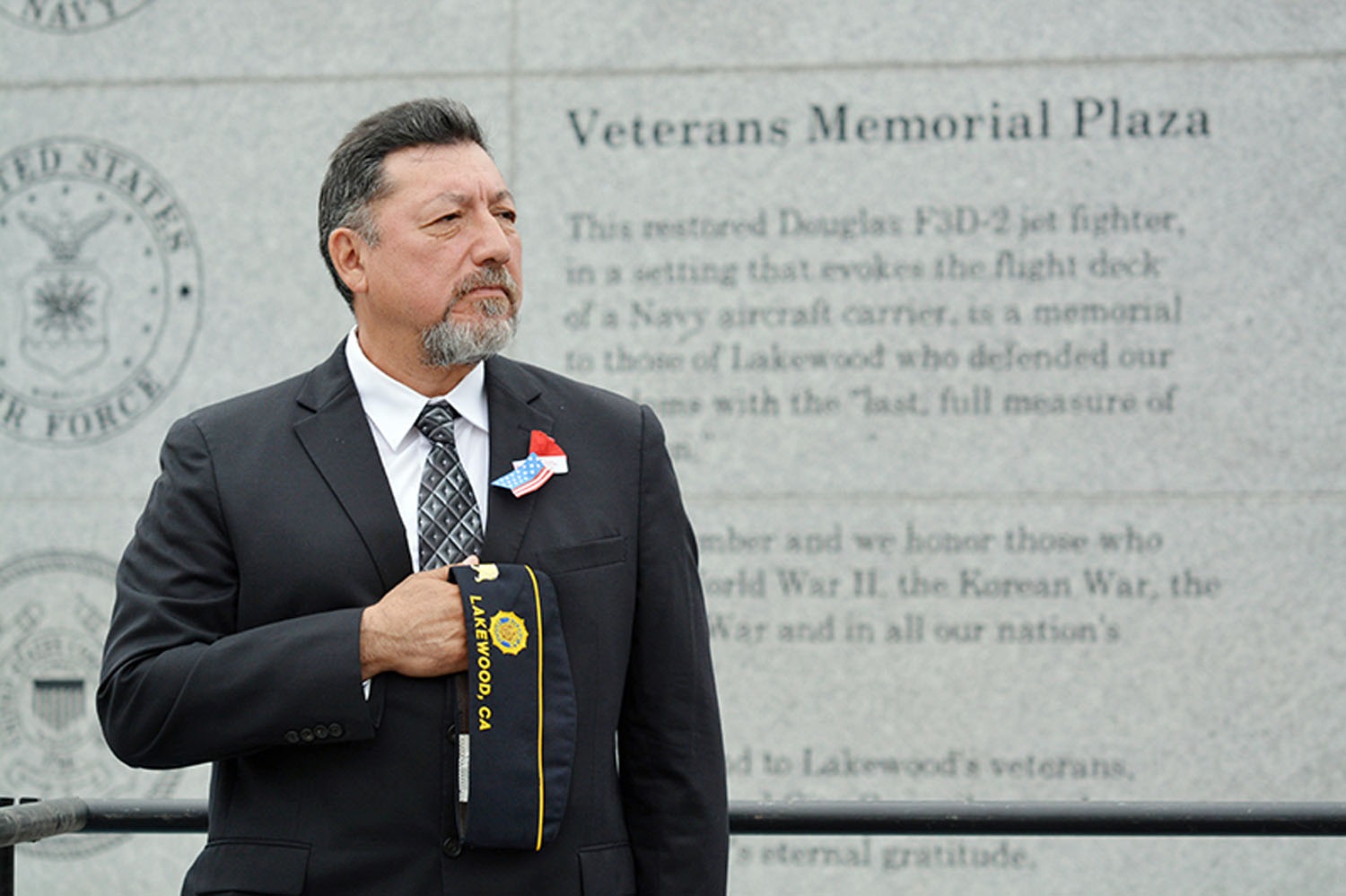 Veteran in front of Memorial Plaza