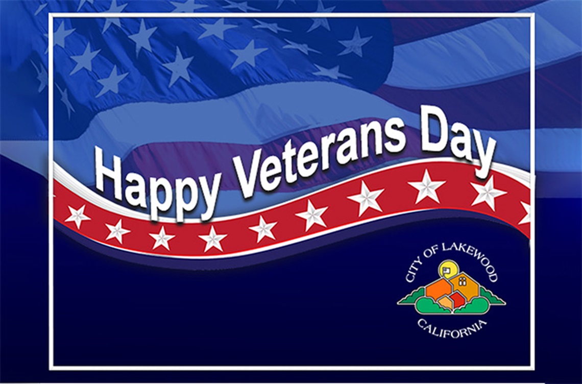 Happy Veterans Day text on blue background