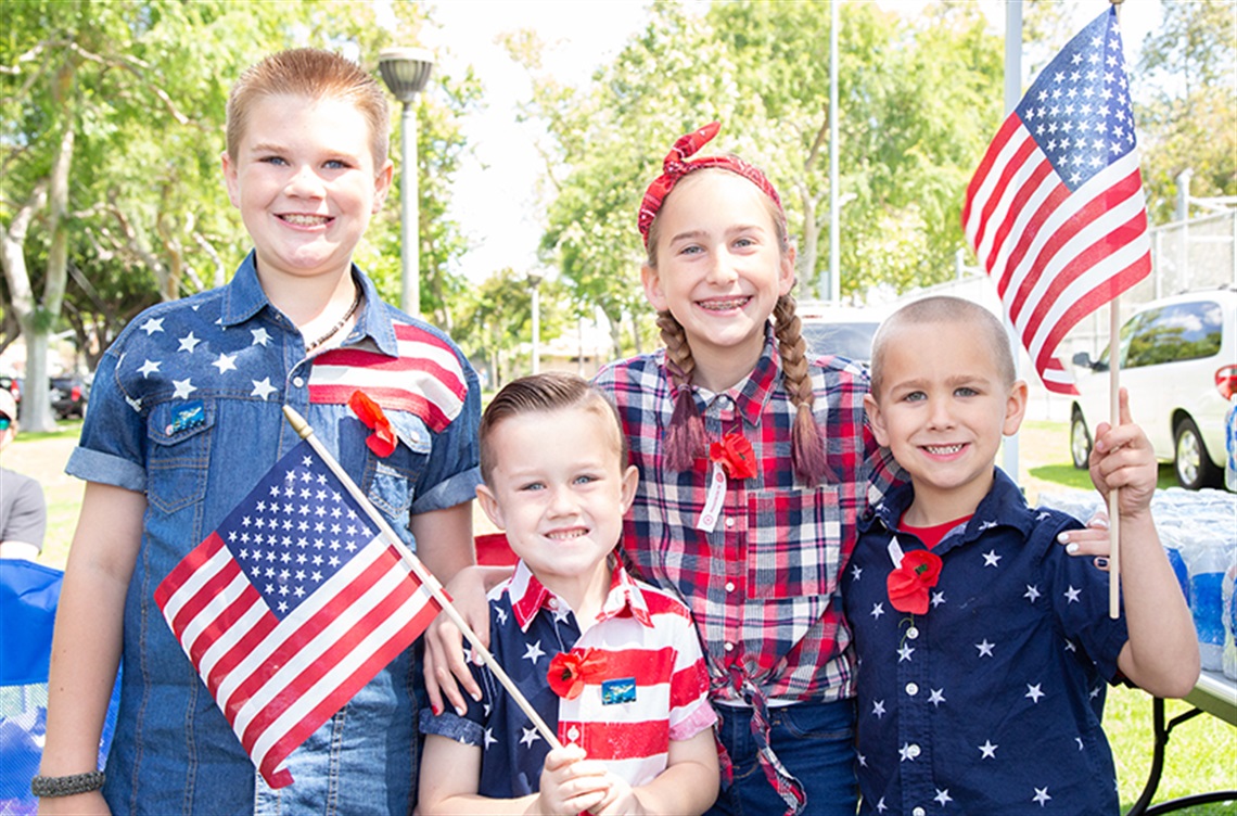 Kids in patriotic attire at Memorial Day event