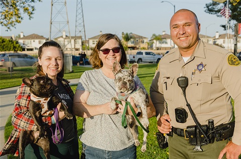 Dogs and deputies at Home Run Dog Park