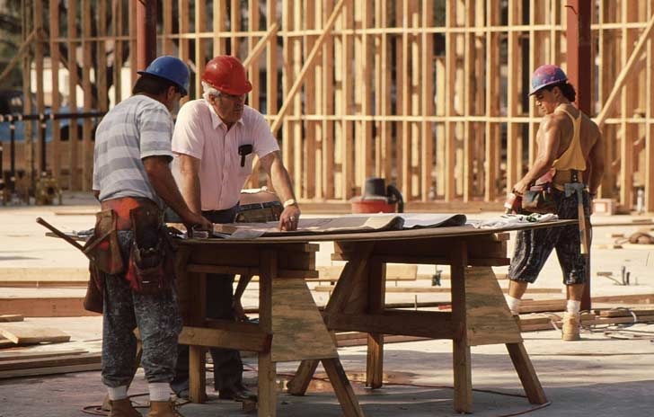 Contractors working on a home construction project
